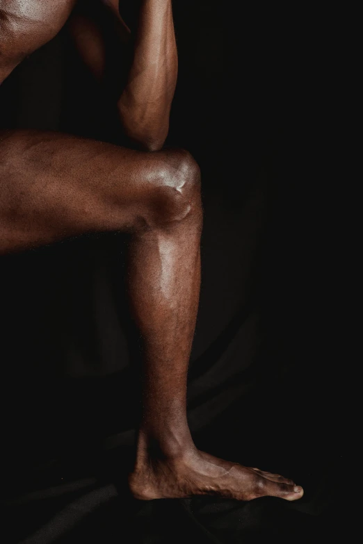 a man's leg with  on