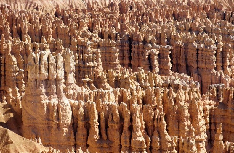 a large canyon filled with tall, rock formations