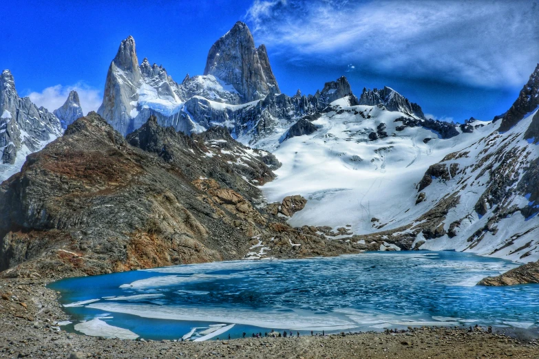 the mountain is very high and the water is clear