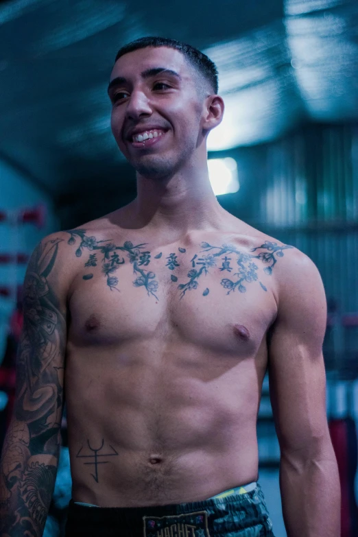 a man that has some kind of tattoos on his body