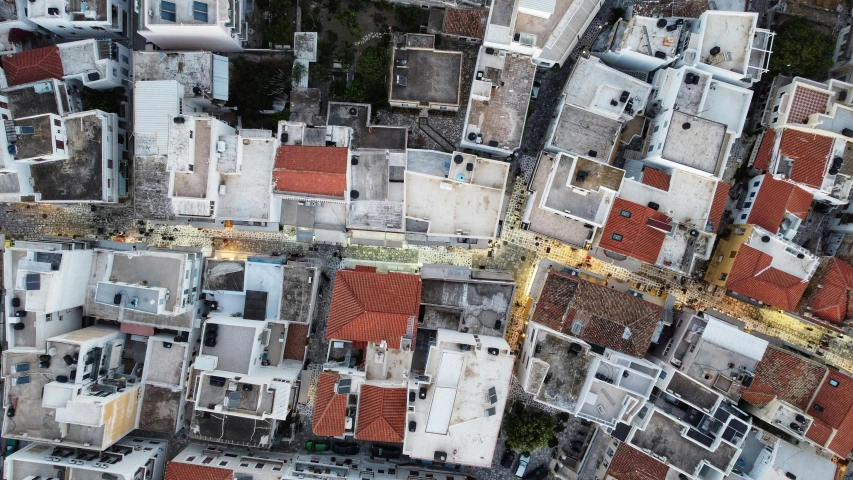 an aerial view of old residential buildings with red roof tiles