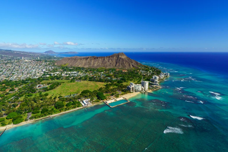 an aerial view of a city on a beach in hawaii