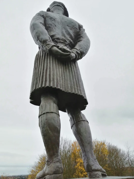 a statue of a person in an ancient greek dress