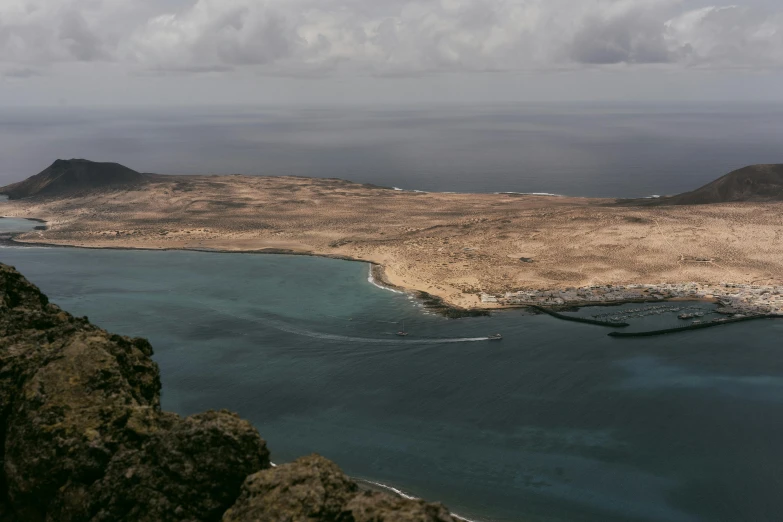 an aerial view of the ocean and coastline from a distance