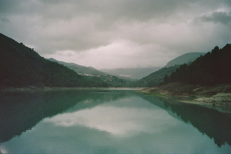 a small boat is floating on the water