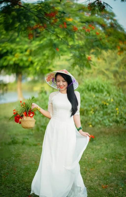 the woman is posing in her white gown