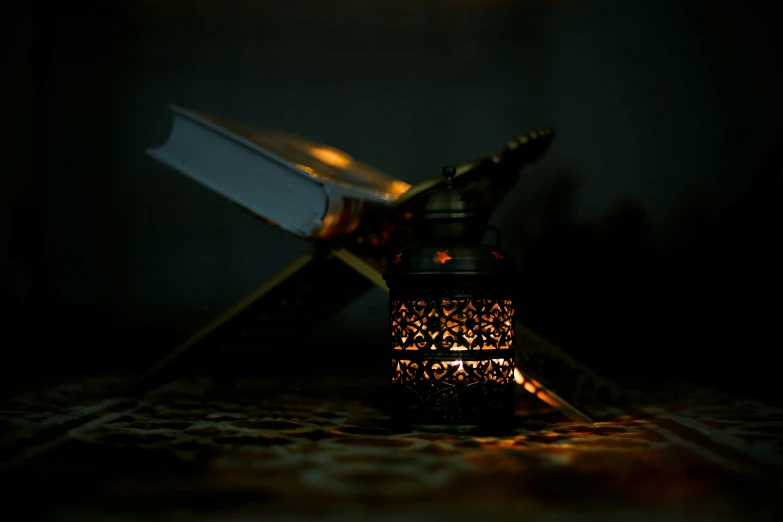 a lamp that is sitting on a rug with two knives