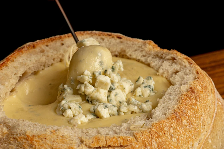 a closeup s of food in a piece of bread