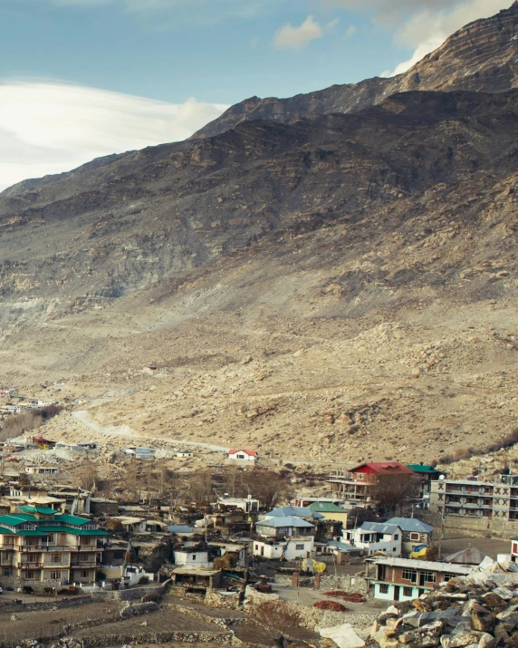 there are houses and buildings on the mountain side