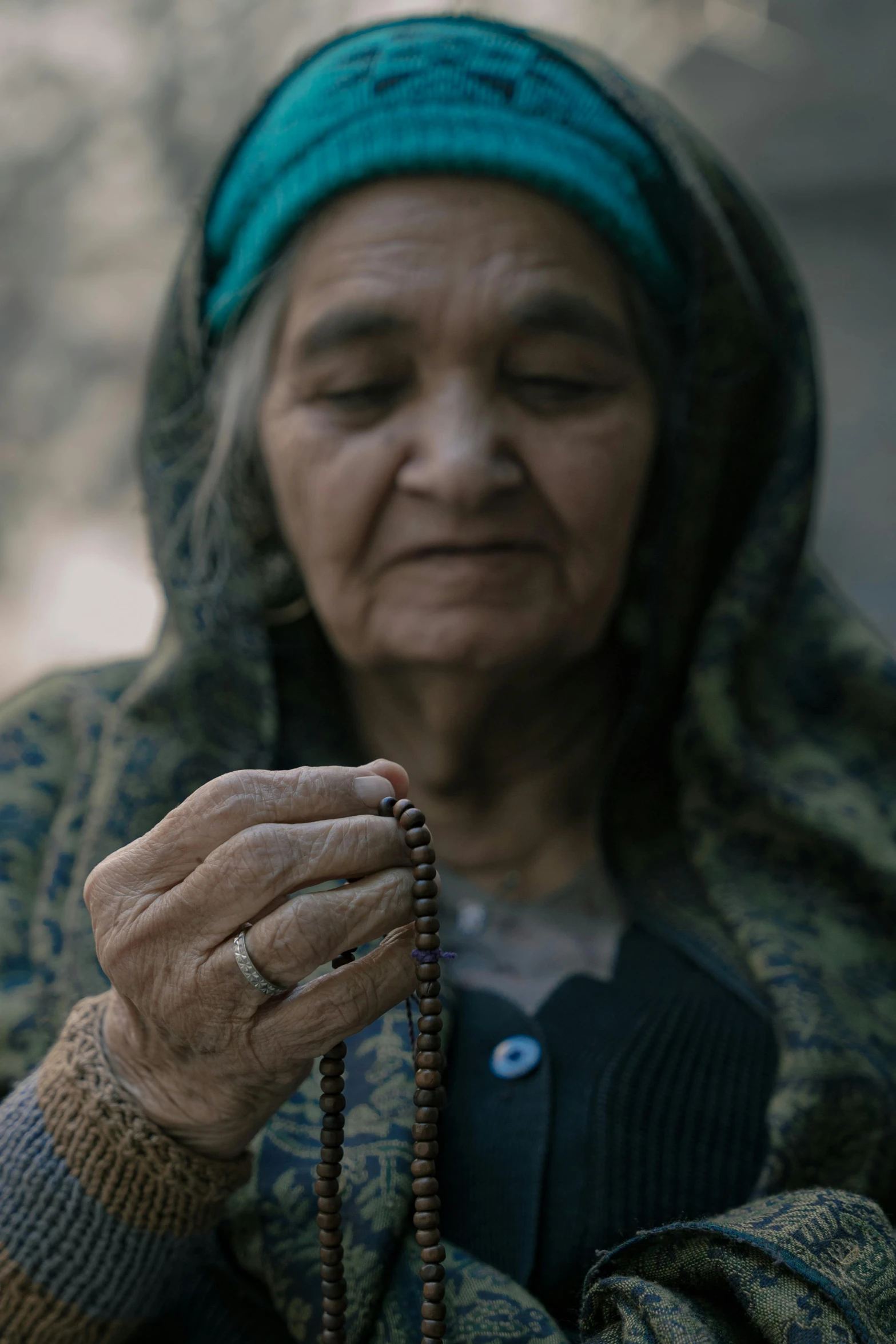 a woman with a cross on her hand