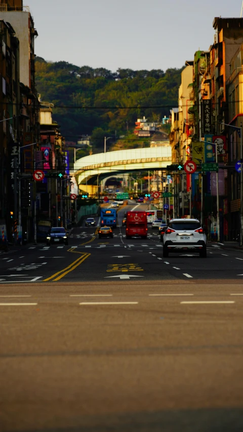 a city street filled with lots of traffic