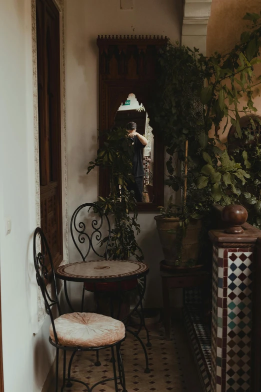 an ornate doorway leading to a dining room area