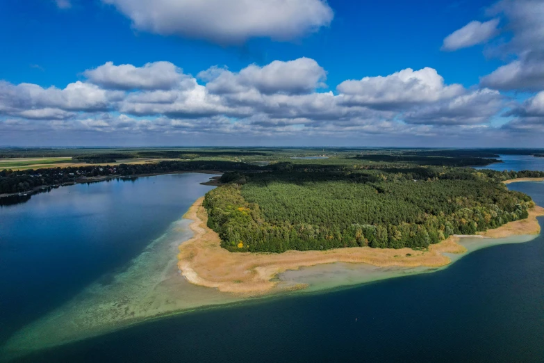 an aerial s of an island on the water