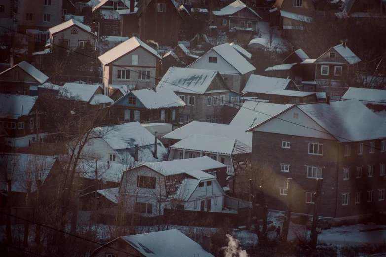 a large urban area with a snowy sky