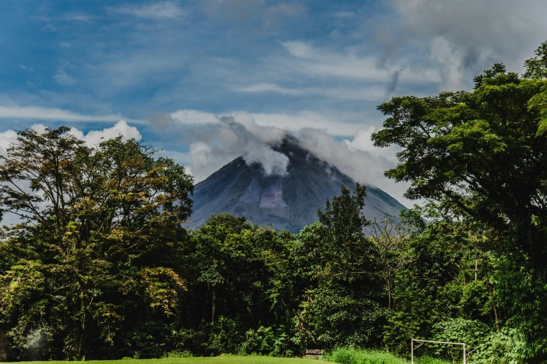 an image of a mountain covered in smoke