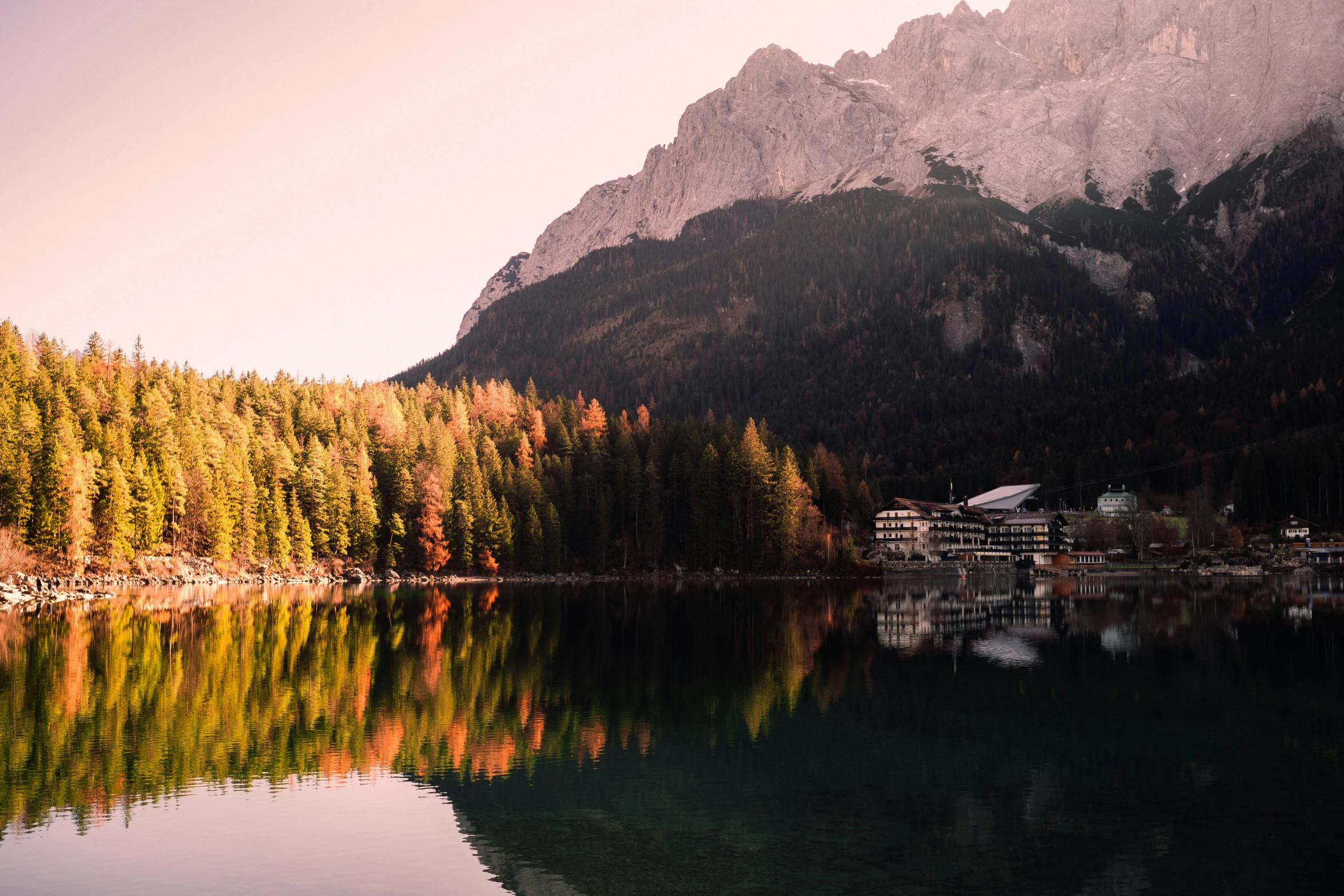 a small lake with many clear blue waters in the mountains