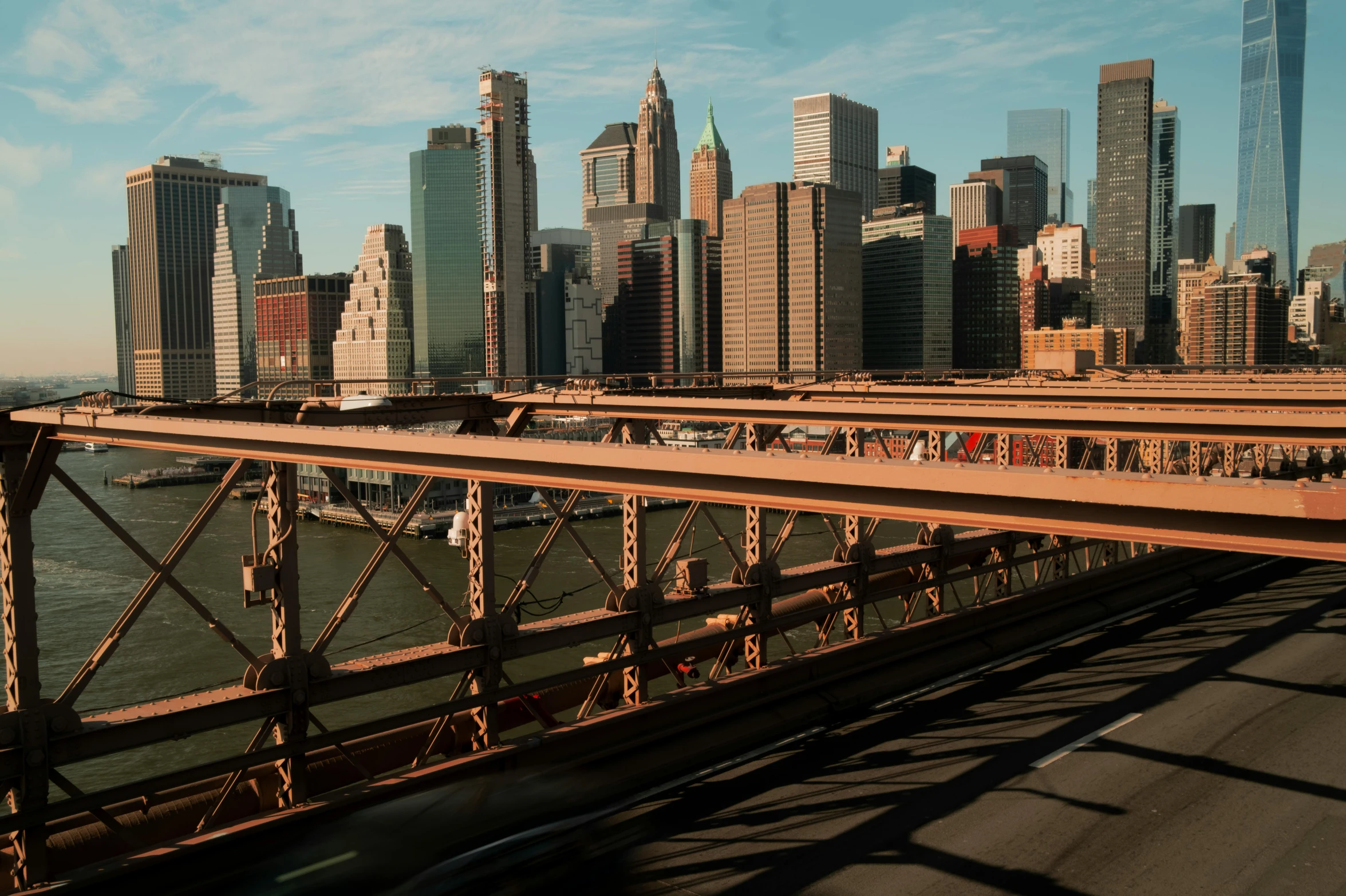 a view of a city overpass over the water