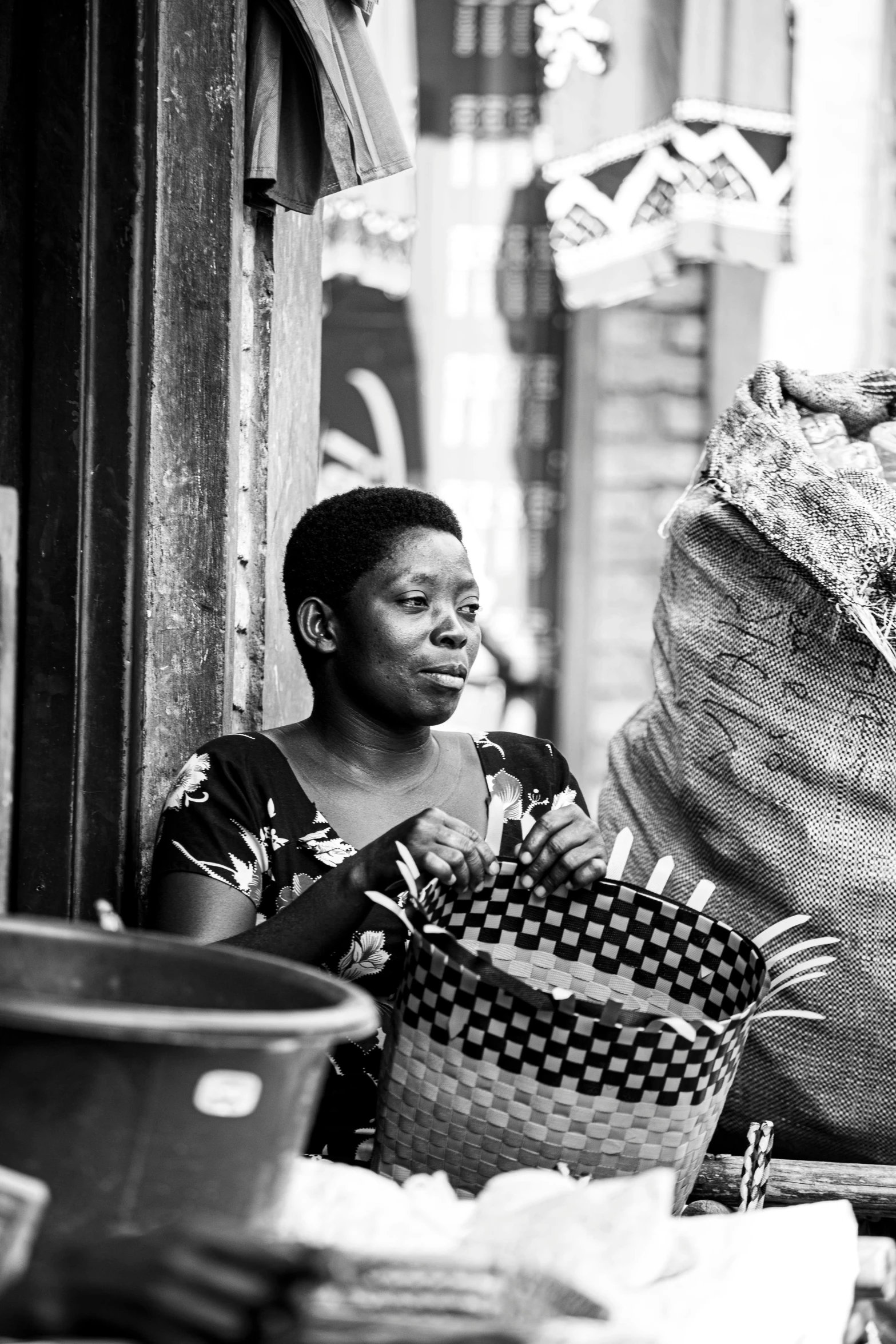 a man looking at some bags in front of him