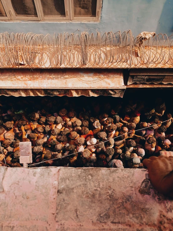 an open case filled with assorted items next to a wall