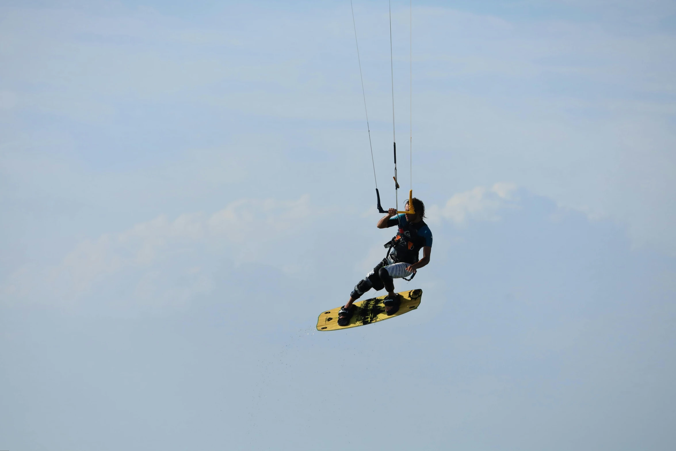 a person is on a board with rope