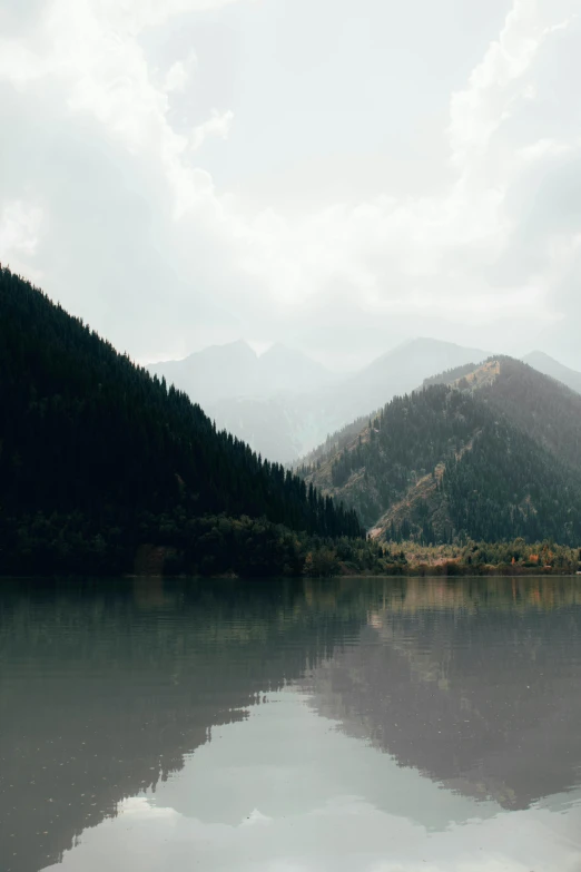 a beautiful landscape that is reflecting off the water