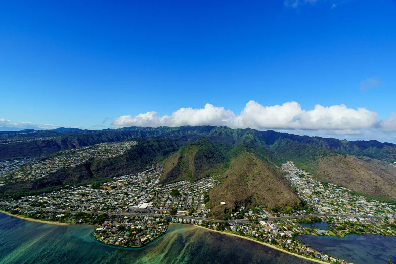 an aerial view of a large ocean town