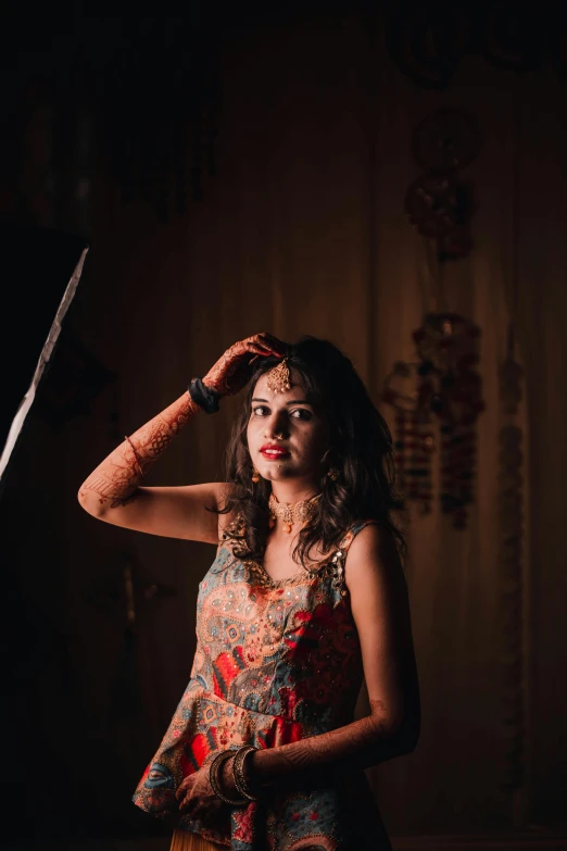 a woman standing up, with a knife in her hand