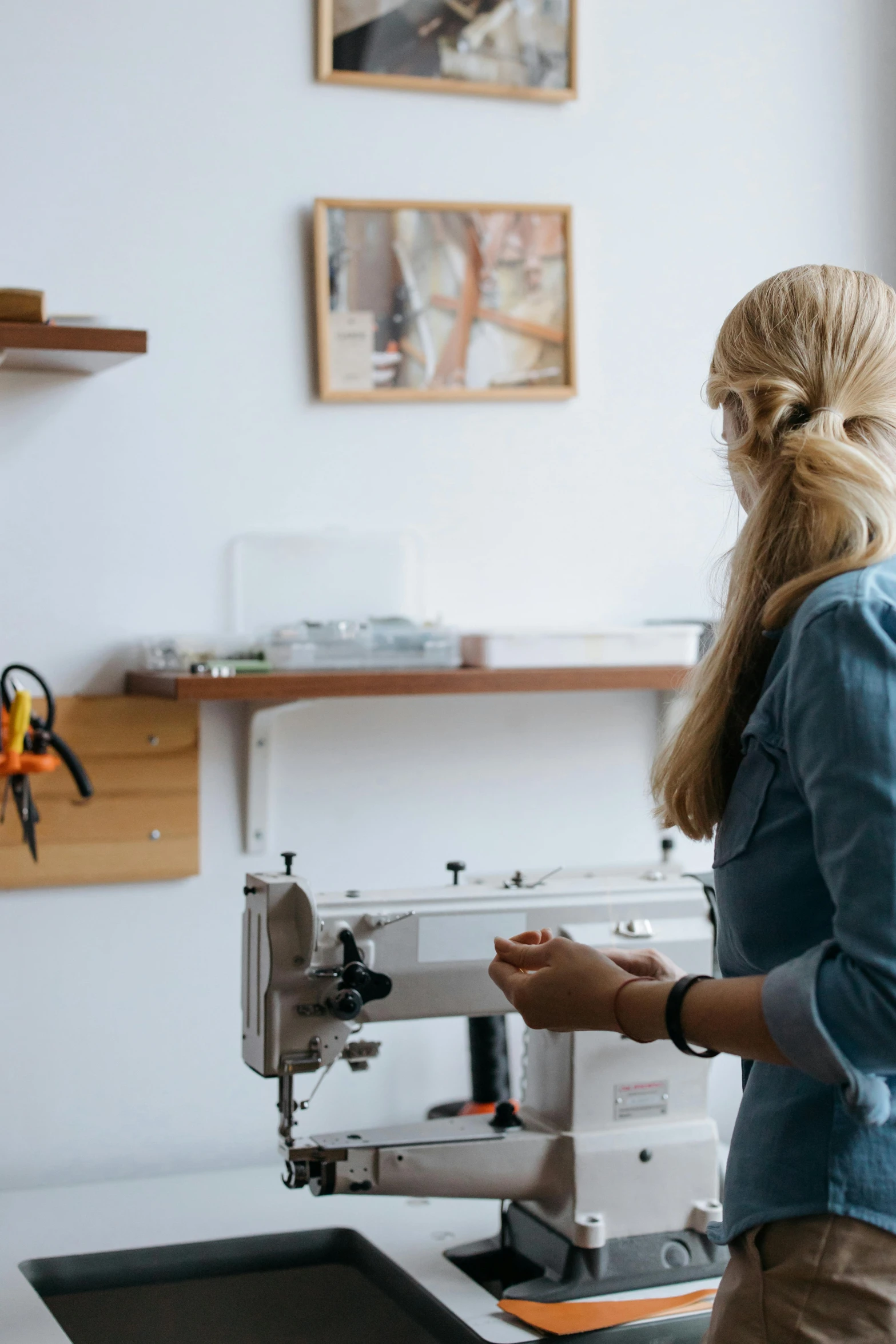 the woman is working in the sewing machine