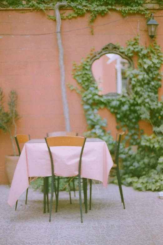 there are three chairs around the table set up