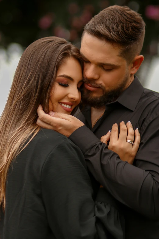 a couple posing together for a po