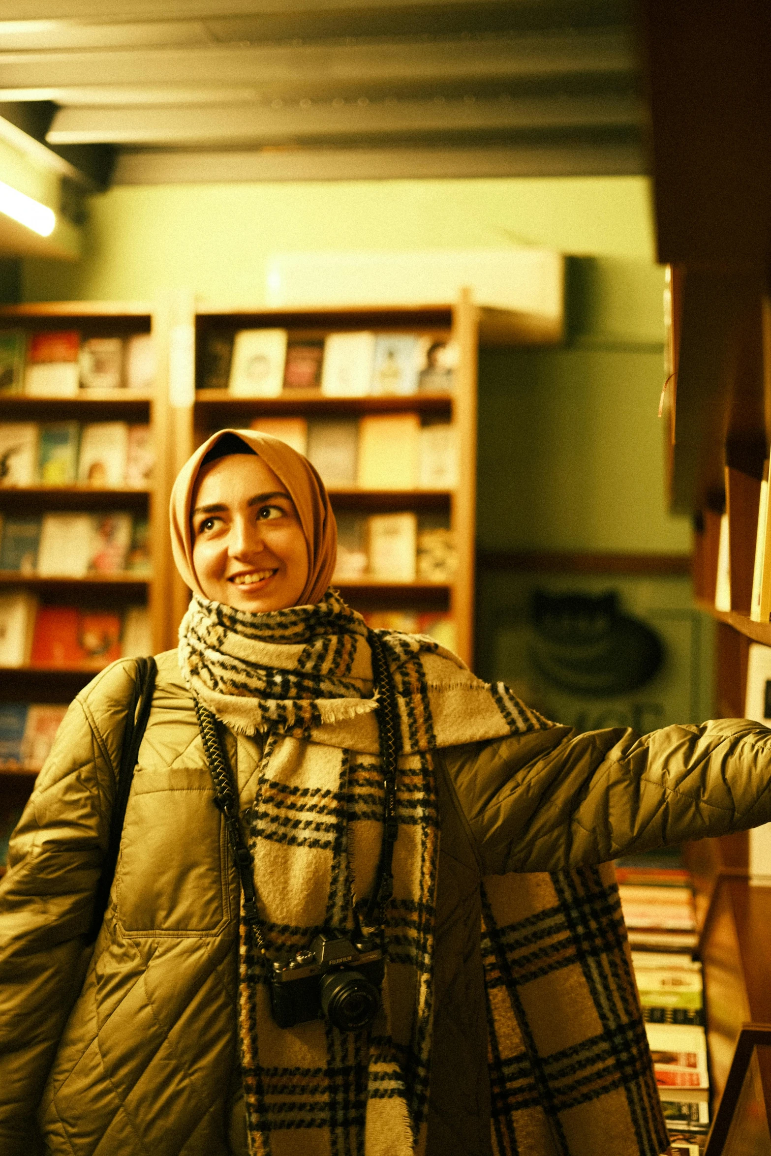 a girl in a burka hat is posing for the camera