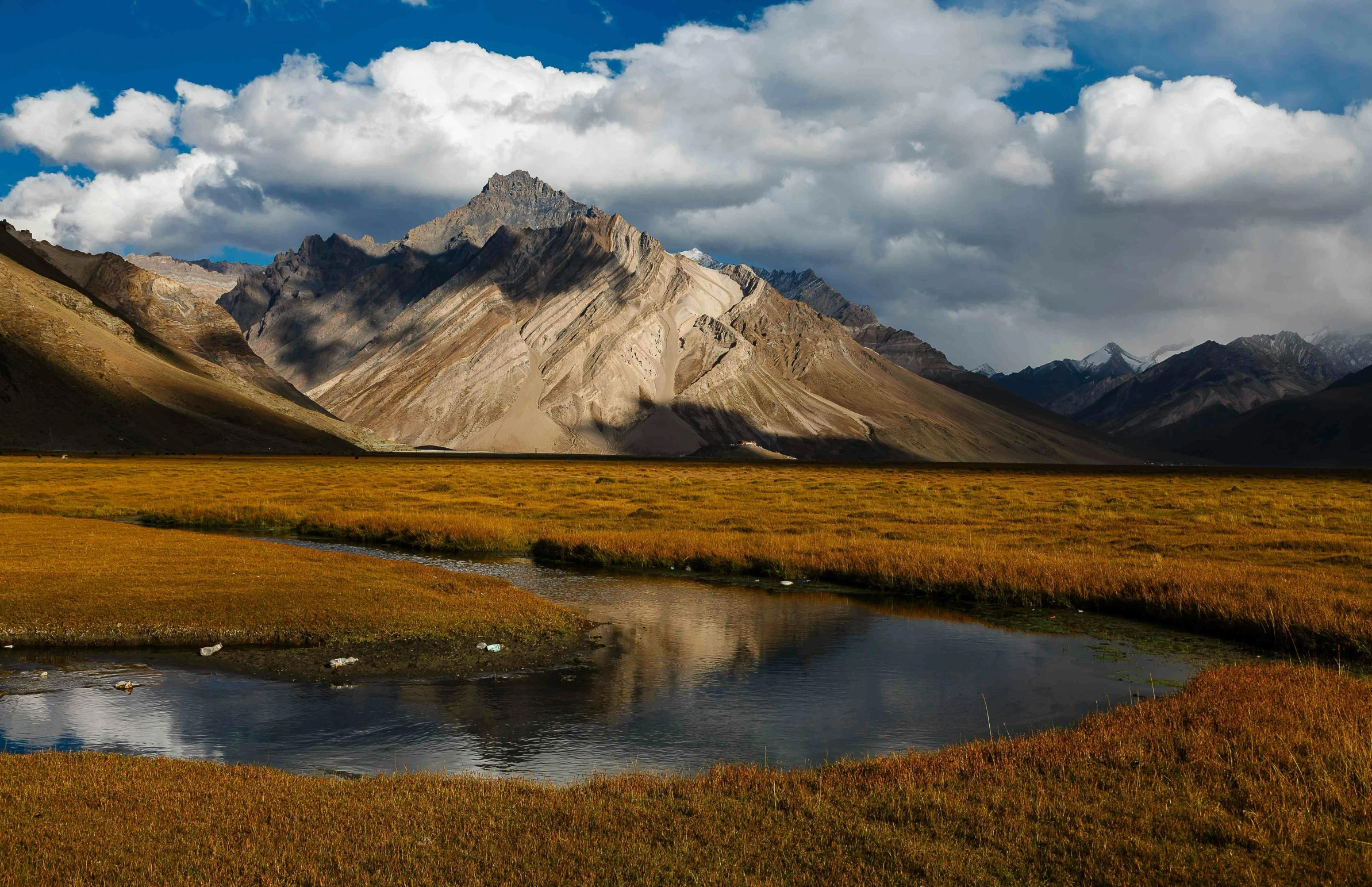 a large body of water surrounded by mountains