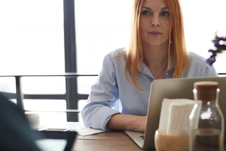 a women who is on her laptop working