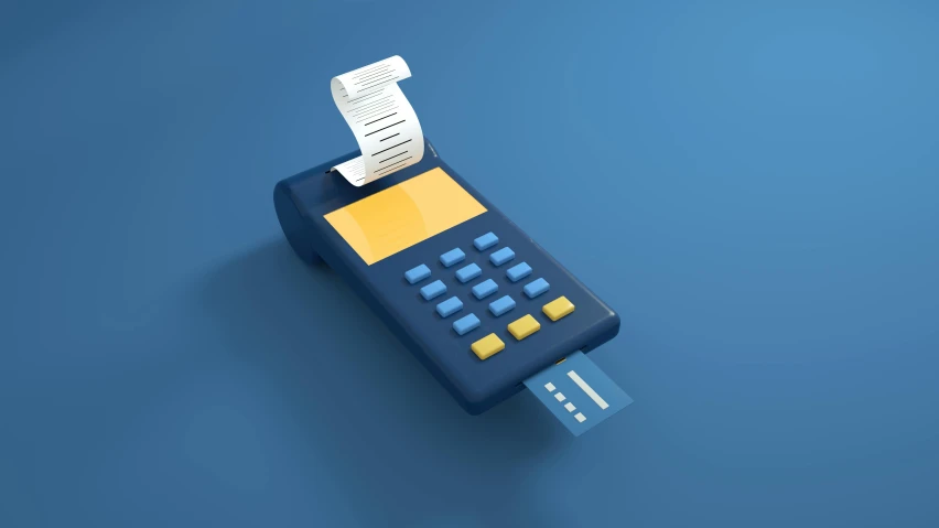 a yellow and blue calculator is sitting on a blue surface