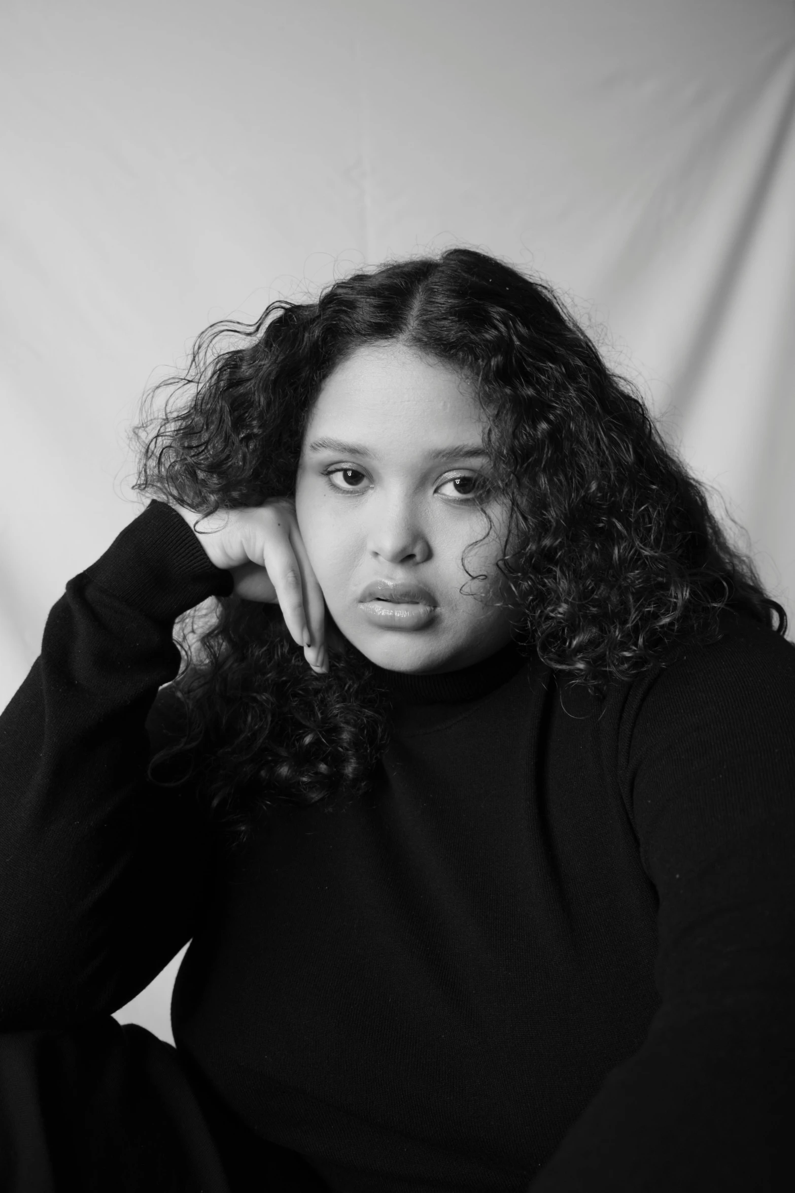 a woman in black shirt posing for a picture