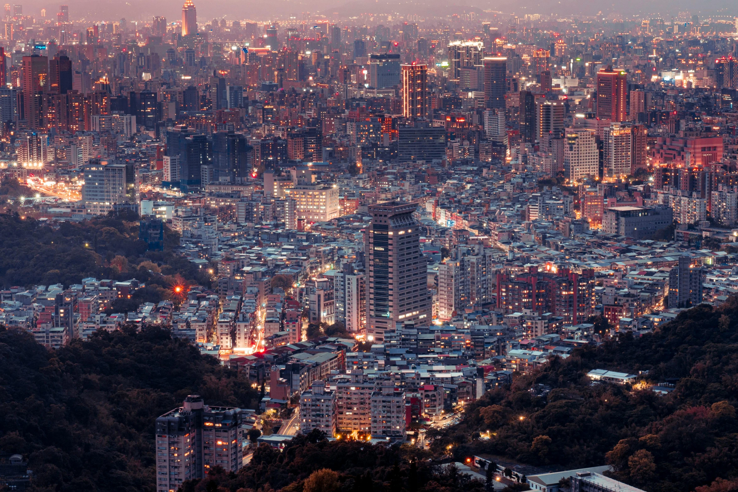 an aerial view of a city at night