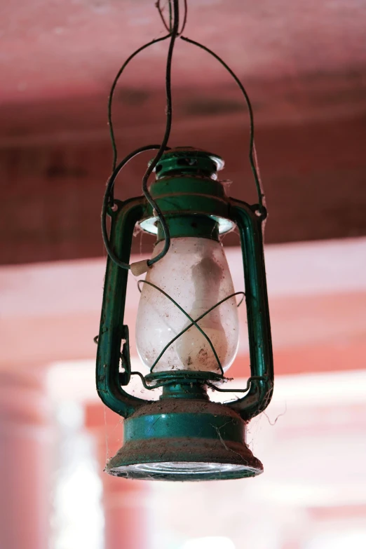 the lamp has a green wire attached to it