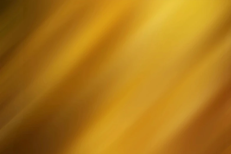a yellow and brown blurred background with blur