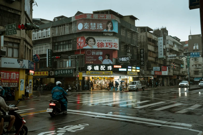 an asian city with a very large building and people