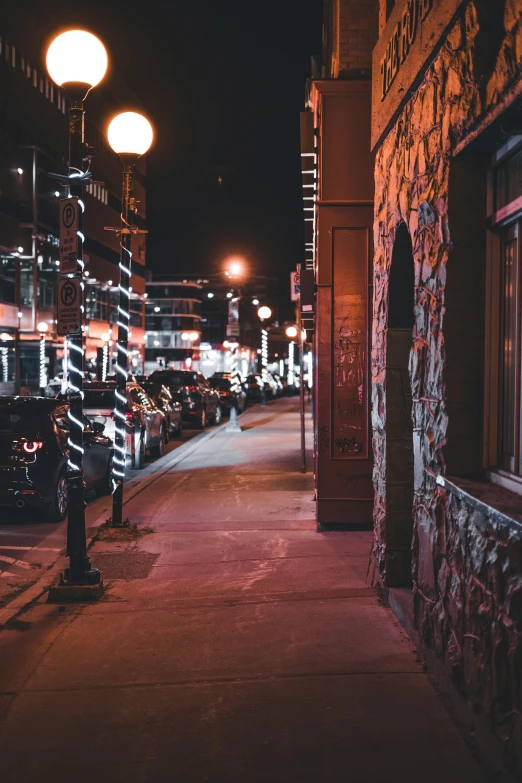 parked cars are lined up outside a building