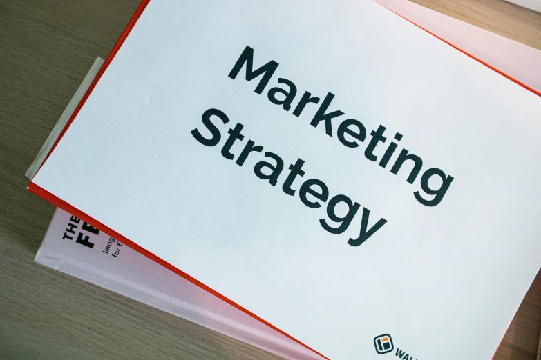 a close up image of a sign that says marketing strategy