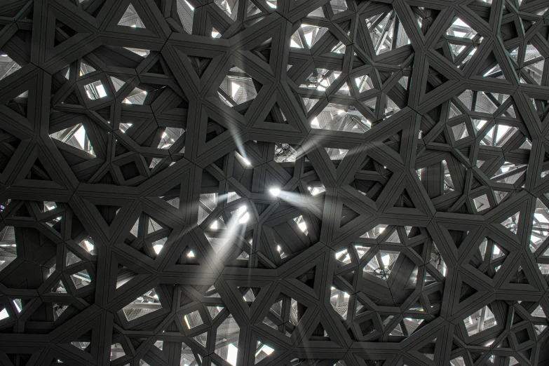 sunlight shining through the roof of a metal structure