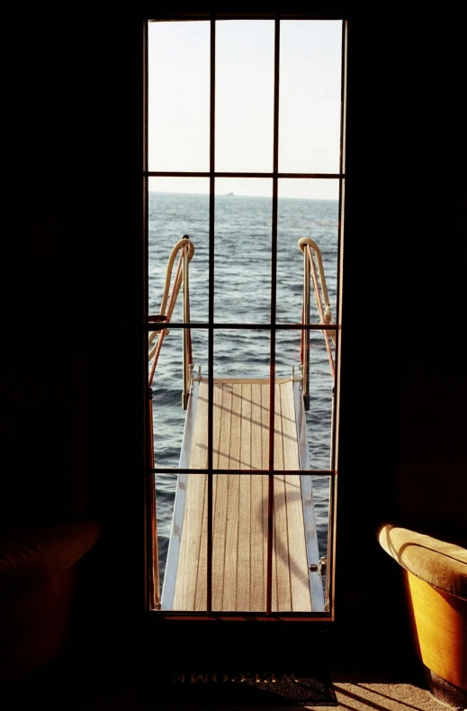 the view of the ocean out of a window