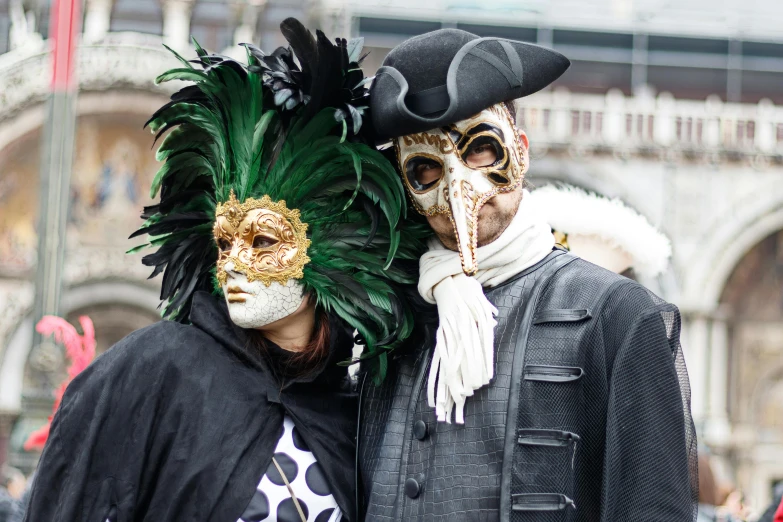 two people dressed in costumes standing together