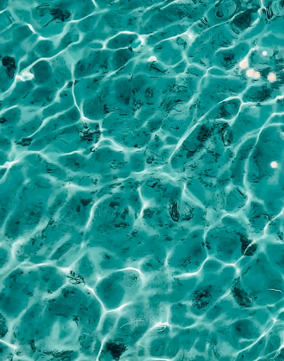 the surface of a pool filled with water