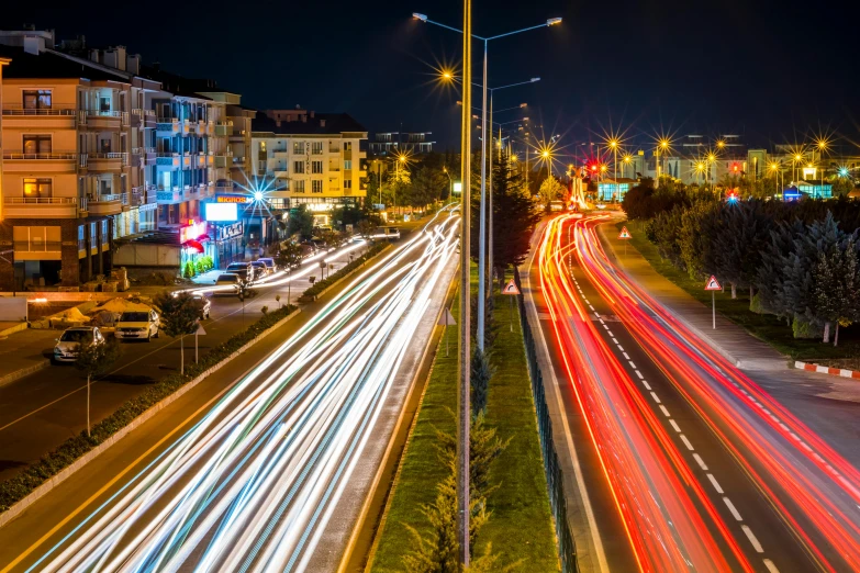 a city street with long exposure lights taken