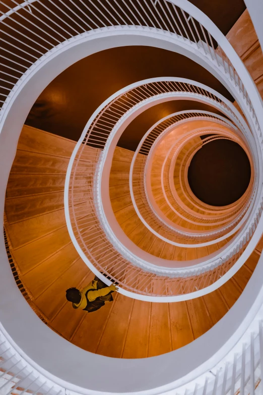 an aerial po taken from above of several spiral stairs