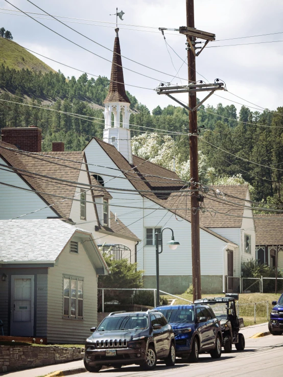 a row of houses on the corner with their roofs ripped off