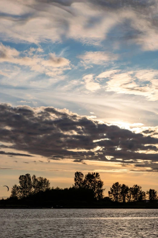 some clouds are moving in a very pretty sunset