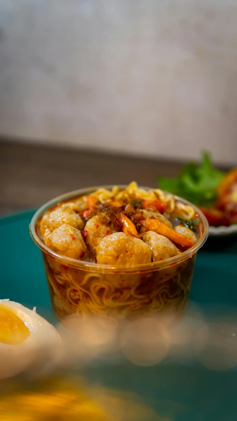 two dishes of food on top of a table